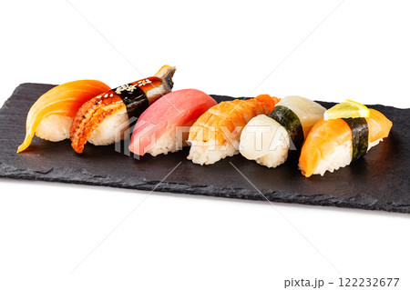 Set of japanese traditional sushi at stone plate isolated at white background. 122232677