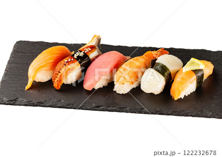 Set of japanese traditional sushi at stone plate isolated at white background. 122232678
