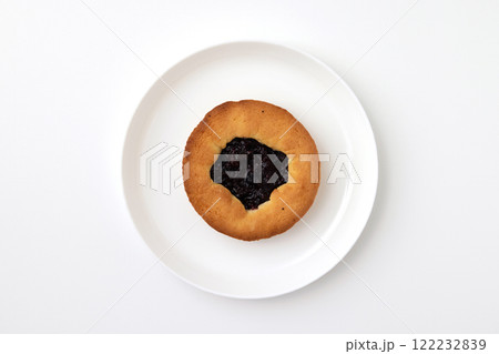 Sweet bakery at a round plate isolated at white background. Pastry image 122232839