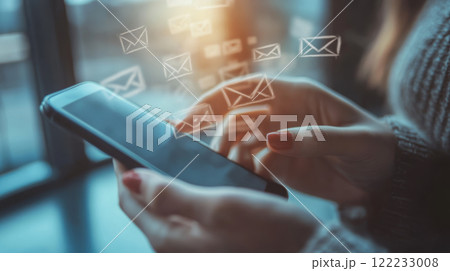 Close-up of Hands Sending Emails on Smartphone 122233008