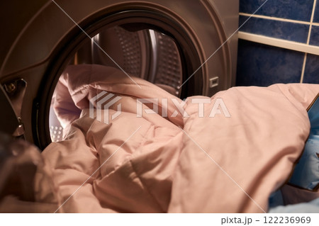 Laundry Day Enjoying the Soft and Fresh Bedding That Comes Straight from the Dryer 122236969