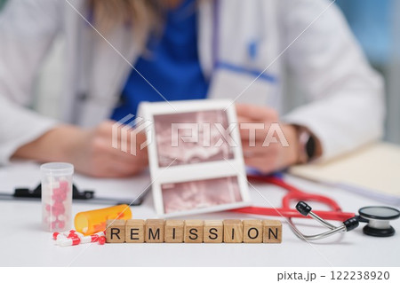 The Doctor is Reviewing the Patients Progress in Their Journey Towards Remission and Recovery The Doctor is Reviewing the Patients Progress in Their Journey Towards Remission and Recovery 122238920