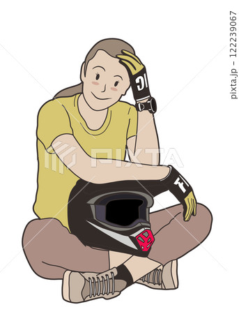girl in yellow shirt sits with helmet, looking thoughtful and relaxed girl in yellow shirt sits with helmet, looking thoughtful and relaxed 122239067