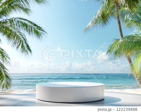 A serene beach scene with trees framing a circular white platform, surrounded by sand and tropical plants, with the ocean in the background. 122239886