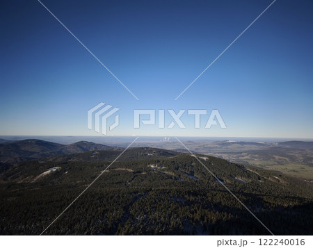 Vast landscape of jested mountain overlooking liberec region in winter 122240016