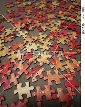 Christmas puzzle pieces forming warm and festive atmosphere 122240038