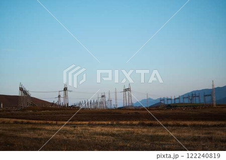 the power poles in the desert of Armenia with a view of the mountains 122240819