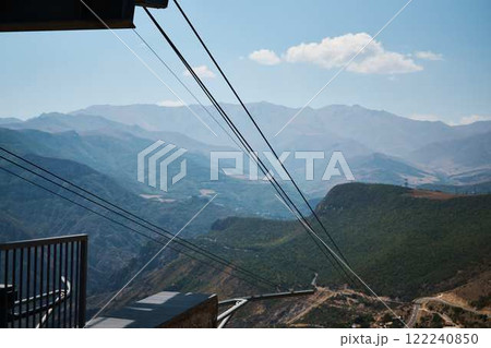 a funicular near Tatev Monastery and a view of the mountains a funicular near Tatev Monastery and a view of the mountains 122240850