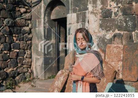 a young woman in scarf Sevanavank, monastery on lake Sevan, armenia a young woman in scarf Sevanavank, monastery on lake Sevan, armenia 122241055