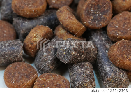 Assorted variety of Pet dog Food Pellets Close-Up 122242568