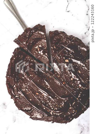 chocolate cake, round cake, on a marble light table, top view, homemade cakes, no people, chocolate cake, round cake, on a marble light table, top view, homemade cakes, no people, 122243160