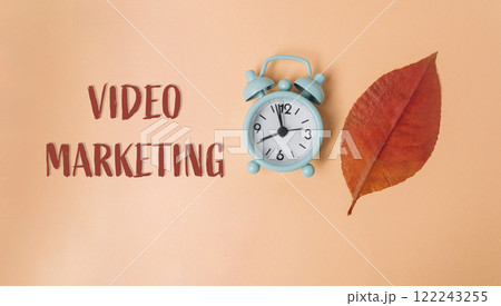 Blue alarm clock with the hands on the numbers 12 and 6 122243255