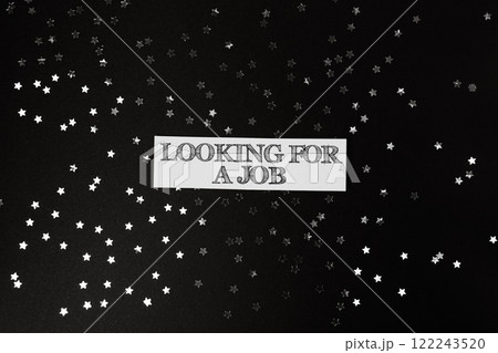 Black background with a white sign that says Looking for a job Black background with a white sign that says Looking for a job 122243520
