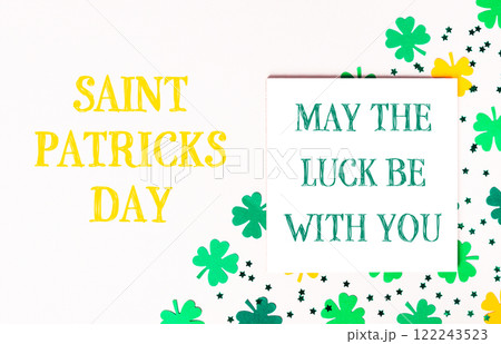 White background with a yellow and green background with a green clover 122243523