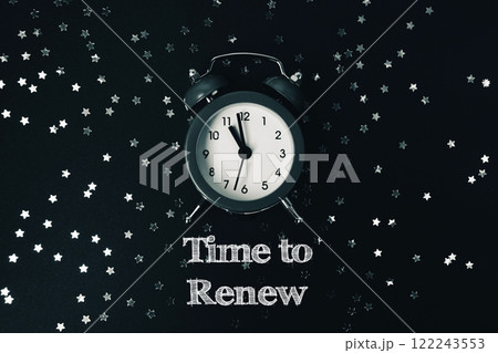 Black and white photo of a clock with the words Time to Renew 122243553