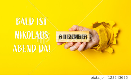 Person holding a block of wood 122243656