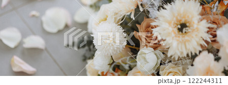 Banner wedding flower bouquet with white and orange petals Banner wedding flower bouquet with white and orange petals 122244311