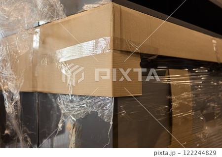 Plastic covered chairs in a modern office setting create an intriguing aesthetic Plastic covered chairs in a modern office setting create an intriguing aesthetic 122244829