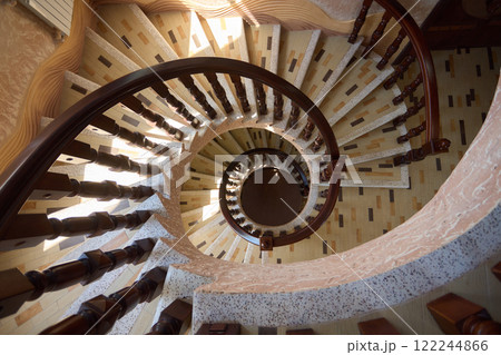An Elegant Spiral Staircase nestled within a Stunning Modern Interior Design Space 122244866