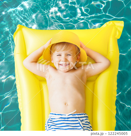 Happy child having fun on summer vacation 122245005