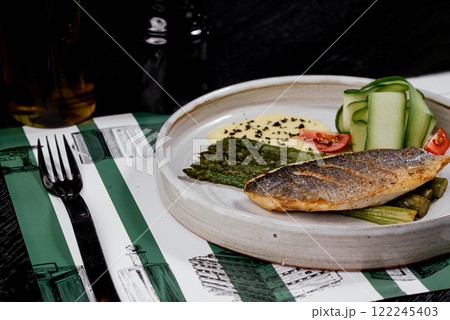 Sea Bass Fillet with Asparagus and Hollandaise Sauce. Sea Bass Fillet with Asparagus and Hollandaise Sauce. 122245403