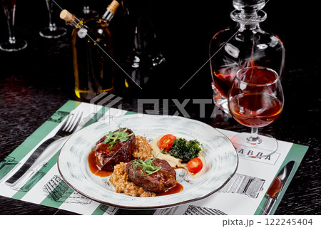 Gourmet Beef Medallions with Red Wine Sauce. 122245404