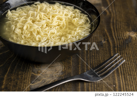 details of flour noodles with eggs during cooking details of flour noodles with eggs during cooking 122245524