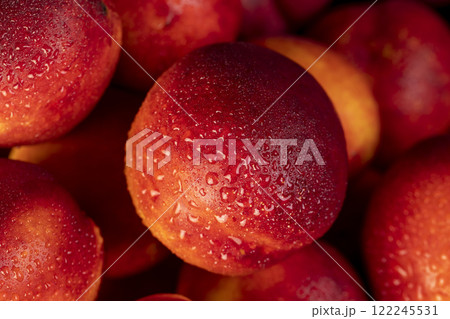 a small harvest of ripe washed nectarines in drops a small harvest of ripe washed nectarines in drops 122245531