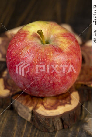 sweet freshly picked apple on the table 122245542