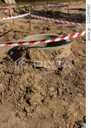 hole in the ground on the site of which a highway was started 122245562