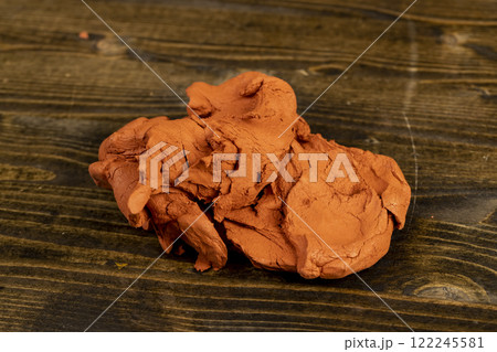 a special paste with the addition of orange clay for creativity and modeling a special paste with the addition of orange clay for creativity and modeling 122245581