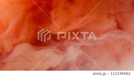 Orange smoke. Fume paint. Delicate light blur swirls in vortex. Marbling liquid ink warm color flow surface texture with wave curls. 122246662