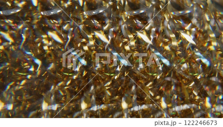 Confetti texture overlay. Blur holiday sparks. Colorful golden glittering particles lens flare circling on bokeh light abstract background. Confetti texture overlay. Blur holiday sparks. Colorful golden glittering particles lens flare circling on bokeh light abstract background. 122246673