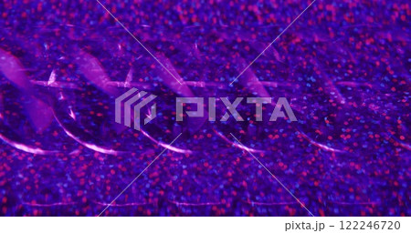 Blur confetti falling. Sparkle particles. Colorful purple transparent gleaming fragments turning on abstract bokeh light background. 122246720