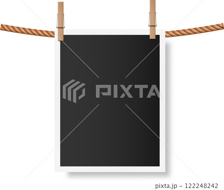 Blank instant photo featuring a white frame, hanging on a clothesline with clothespins, isolated against a white background, casting a soft shadow for a clean, minimal look Blank instant photo featuring a white frame, hanging on a clothesline with clothespins, isolated against a white background, casting a soft shadow for a clean, minimal look 122248242