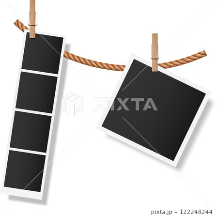 Photo booth style print and blank instant photo are hanging on a clothesline attached with wooden clothespins, creating a vintage and nostalgic feel perfect for showcasing memories or designs Photo booth style print and blank instant photo are hanging on a clothesline attached with wooden clothespins, creating a vintage and nostalgic feel perfect for showcasing memories or designs 122248244