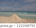Pyramid of sand on the shores of the Caribbean Sea. 122248792