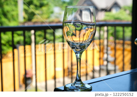 empty wine glass with reflection. Empty wine glass isolated on white background. wine glass. 122250152