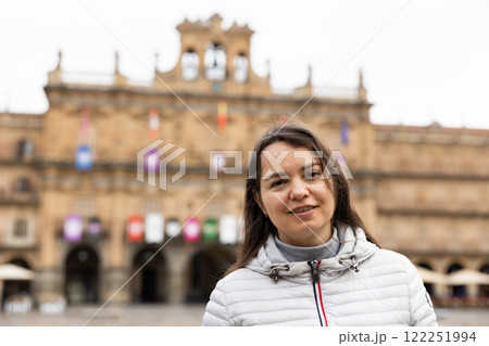 Portrait of a female tourist standing on Plaza Mayor square in Salamanca 122251994