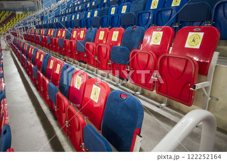 locked chairs at the stadium during the pandemic locked chairs at the stadium during the pandemic 122252164