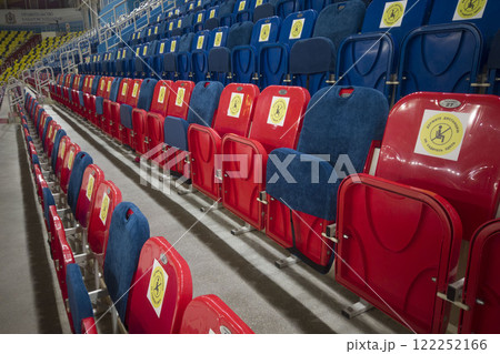 locked chairs at the stadium during the pandemic locked chairs at the stadium during the pandemic 122252166