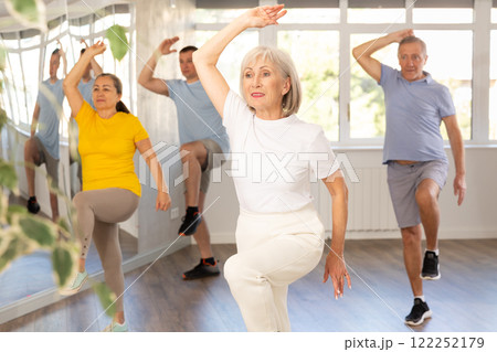 Elderly woman dances modern dances in group Elderly woman dances modern dances in group 122252179