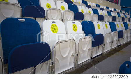 locked chairs at the stadium during the pandemic 122252209