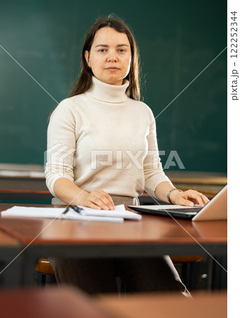 Portrait of a concentrated girl student preparing for classes Portrait of a concentrated girl student preparing for classes 122252344