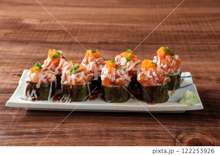 Overloaded Sushi Roll with mayonnaise Sauce. Overloaded Sushi Roll with mayonnaise Sauce. 122253926