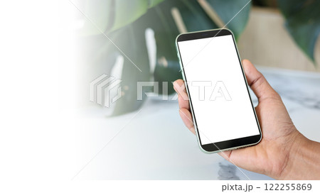 Mockup image screen smartphone, Cell phone with blank space for text, Hand woman work using smartphone, White background for advertising, Marketing, Design, Design creative work space. Mockup image screen smartphone, Cell phone with blank space for text, Hand woman work using smartphone, White background for advertising, Marketing, Design, Design creative work space. 122255869