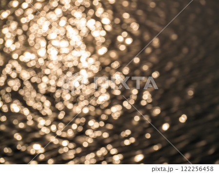 Close-up perspective on rippling water reflections tranquility in nature photography 122256458