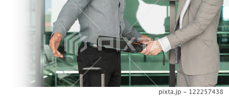 Security man check passenger at entrance in airport 122257438