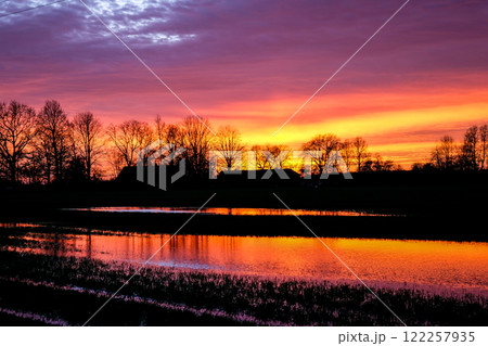 Very beautiful colorful sunset in the spring countryside Very beautiful colorful sunset in the spring countryside 122257935