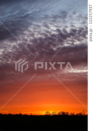 Very beautiful colorful sunset in the spring countryside 122257937